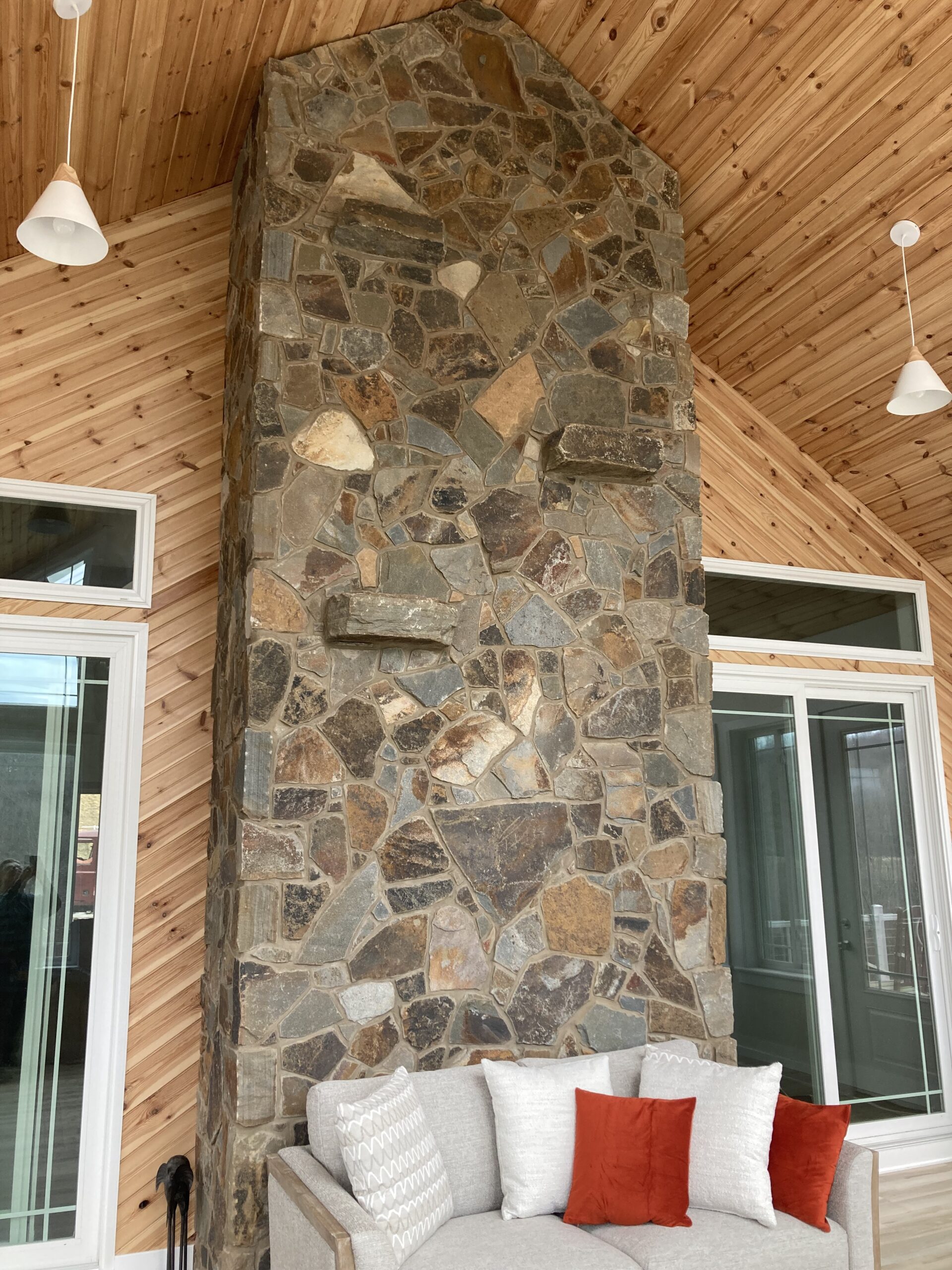 floor to ceiling stone on outside wall of home