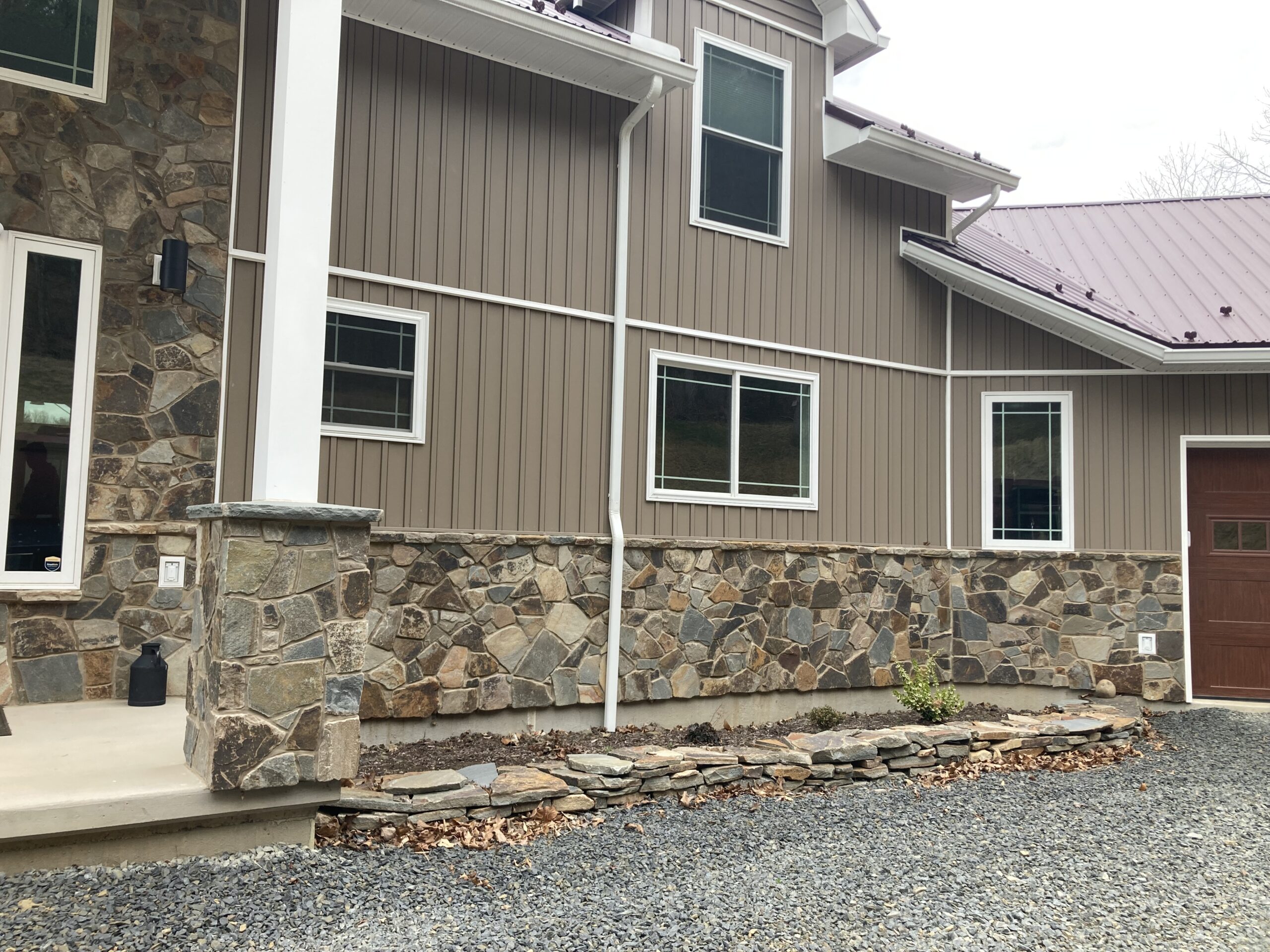 schell stone residential stone on the exterior of a two story home