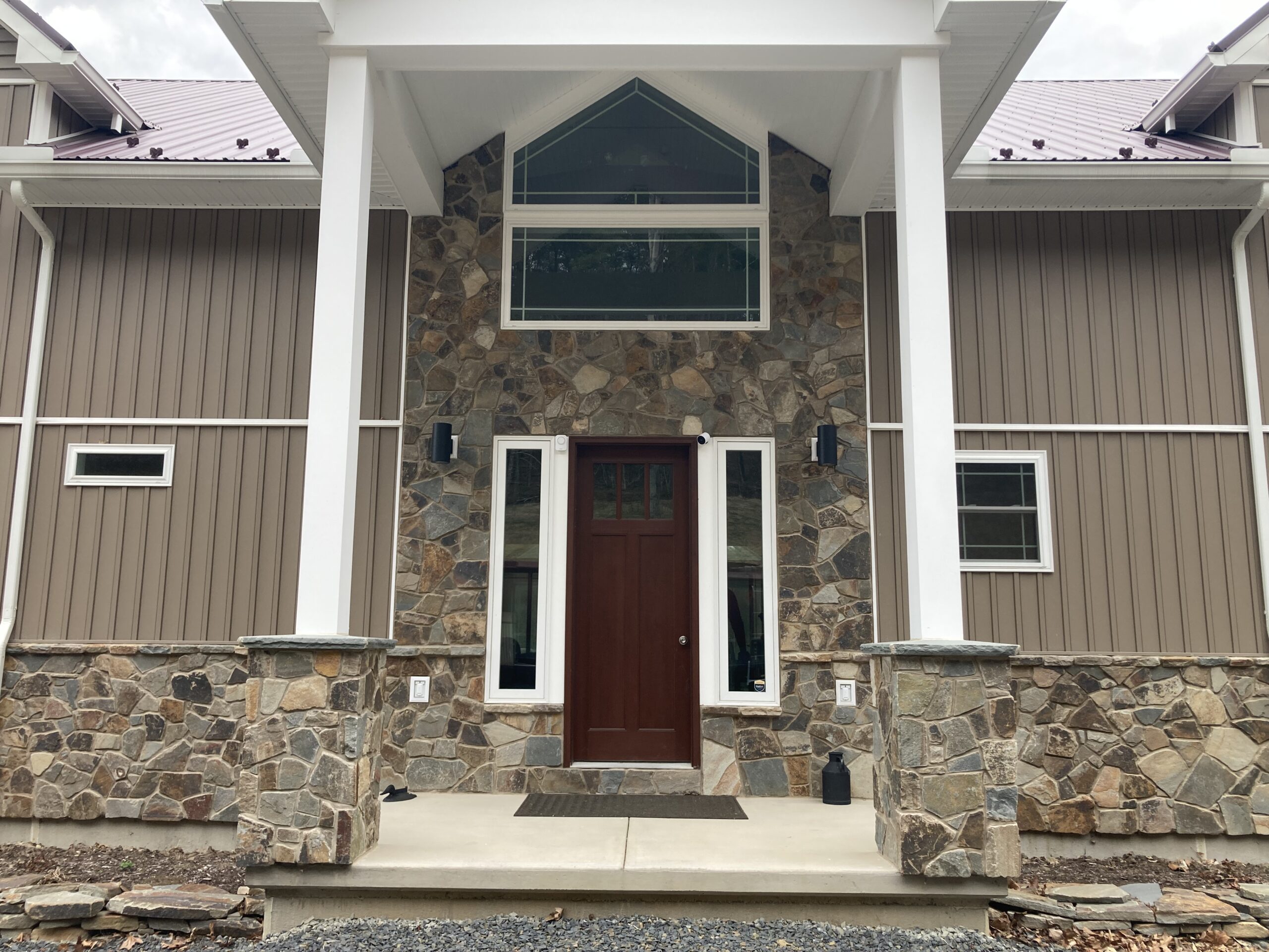schell stone residential stone on the front of a two story house